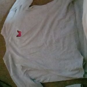 Long sleeve top with pink butterfly